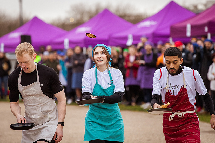 Flipping the light fantastic… Pans at the ready as racers line up for Corporate Pancake Race