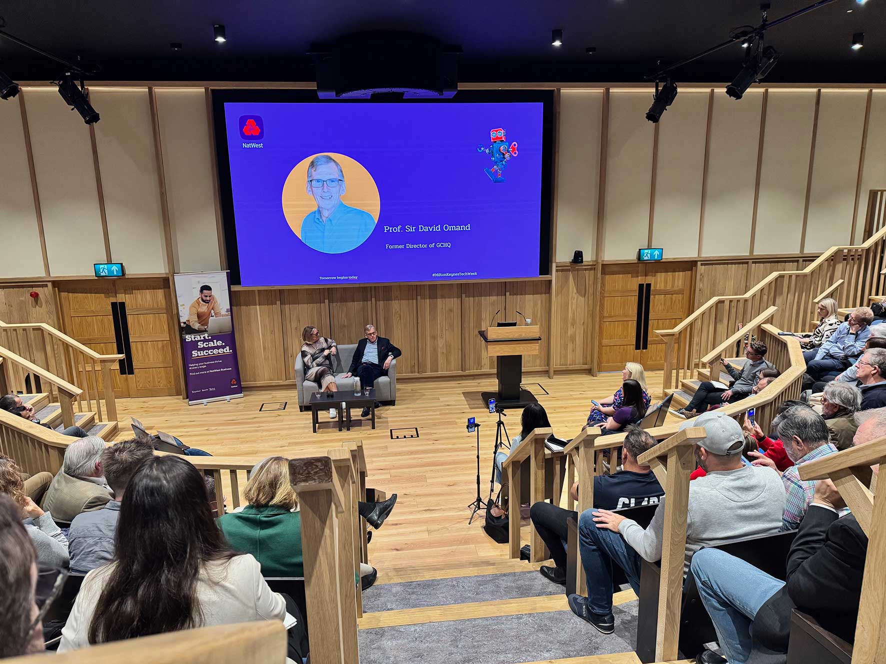 Bukola Adisa MBE leads the discussion on AI innovation with Lubna Thomas of Microsoft and Marcus Ralphs of Whitespace Global at Bletchley Park.
