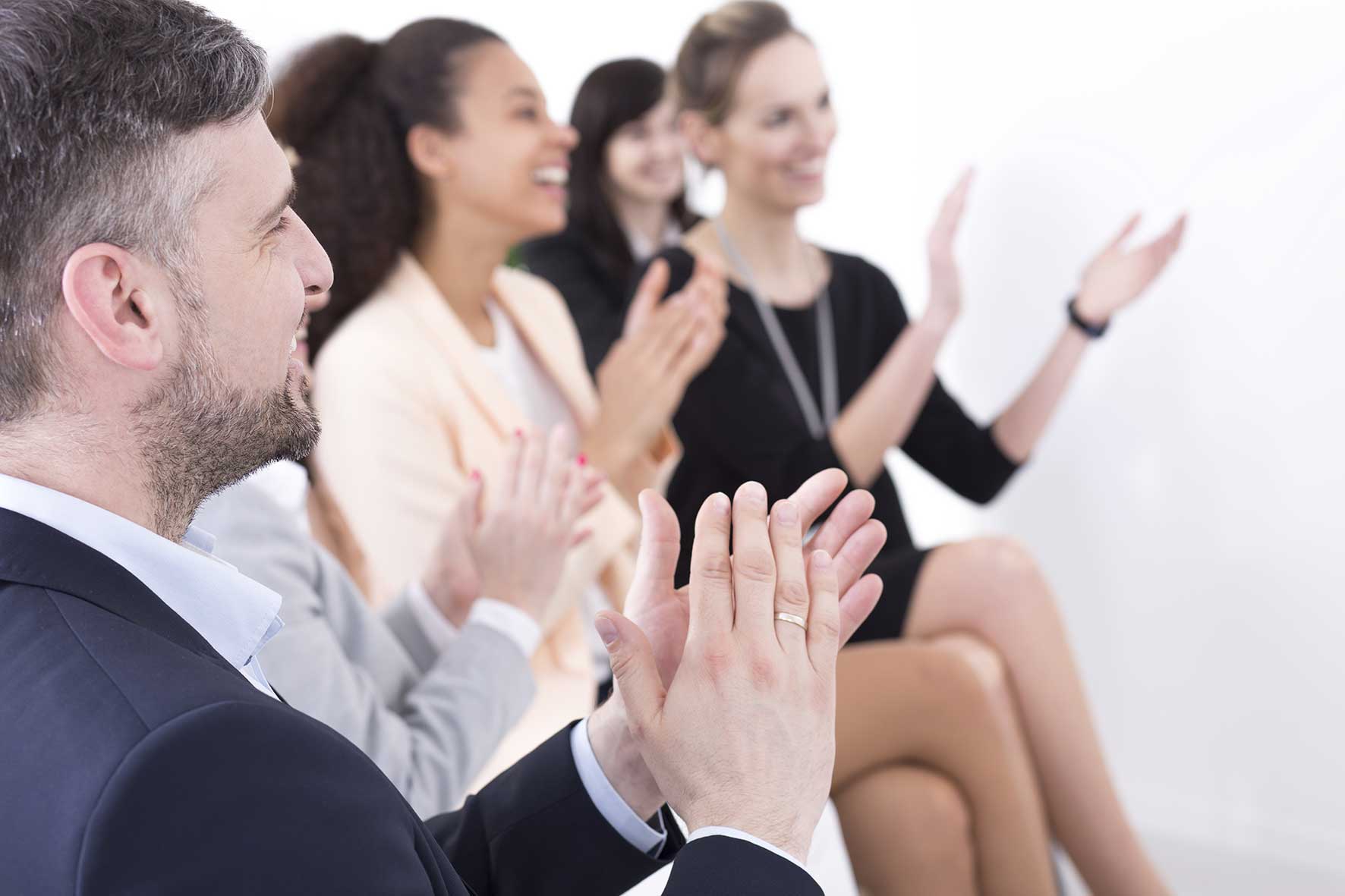 Businesspeople clapping hnds