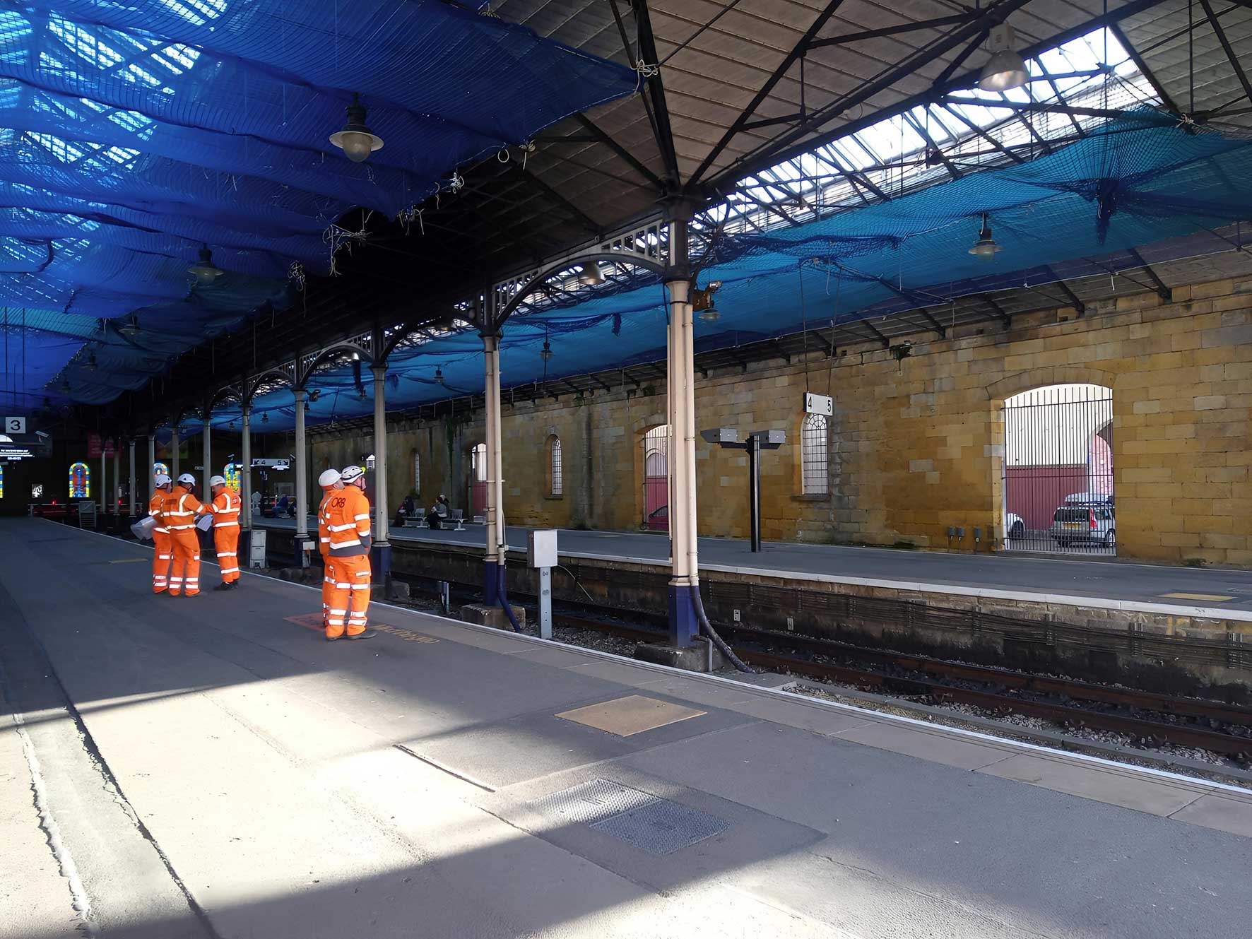 Mainmark ground engineering team working on railway platform infrastructure in the UK