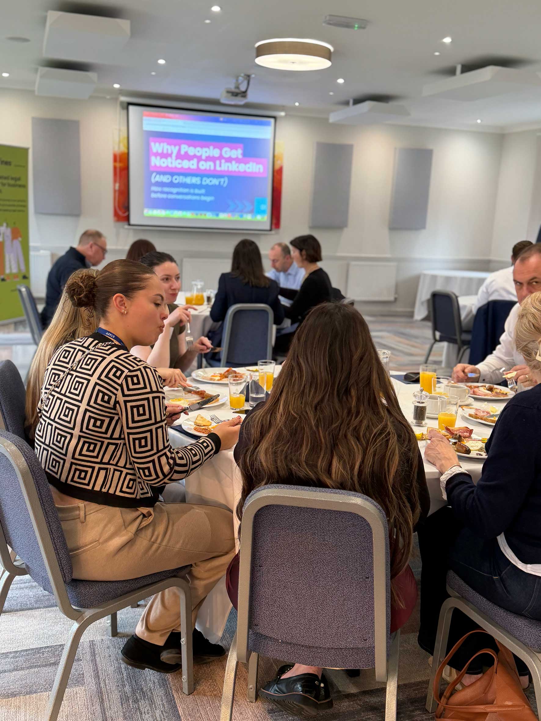 Business professionals networking at a previous Bedford Breakfast Club event at Bedfordshire Golf Club