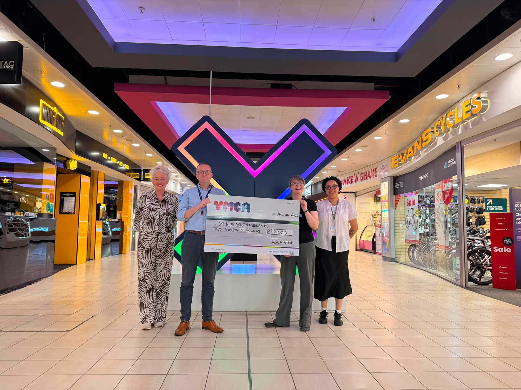 Landsec-and-YMCA-South-Midlands---Dan-Murphy-Centre-Director-at-Xscape-Sharon-Harrison-Business-Development-and-Fundraising-Manager-and-Hollie-Wills-Fundraising-and-Partnerships-Officer- | Business MK YMCA South Midlands and Xscape Milton Keynes mark their employment partnership with a £2,000 donation at Xscape.