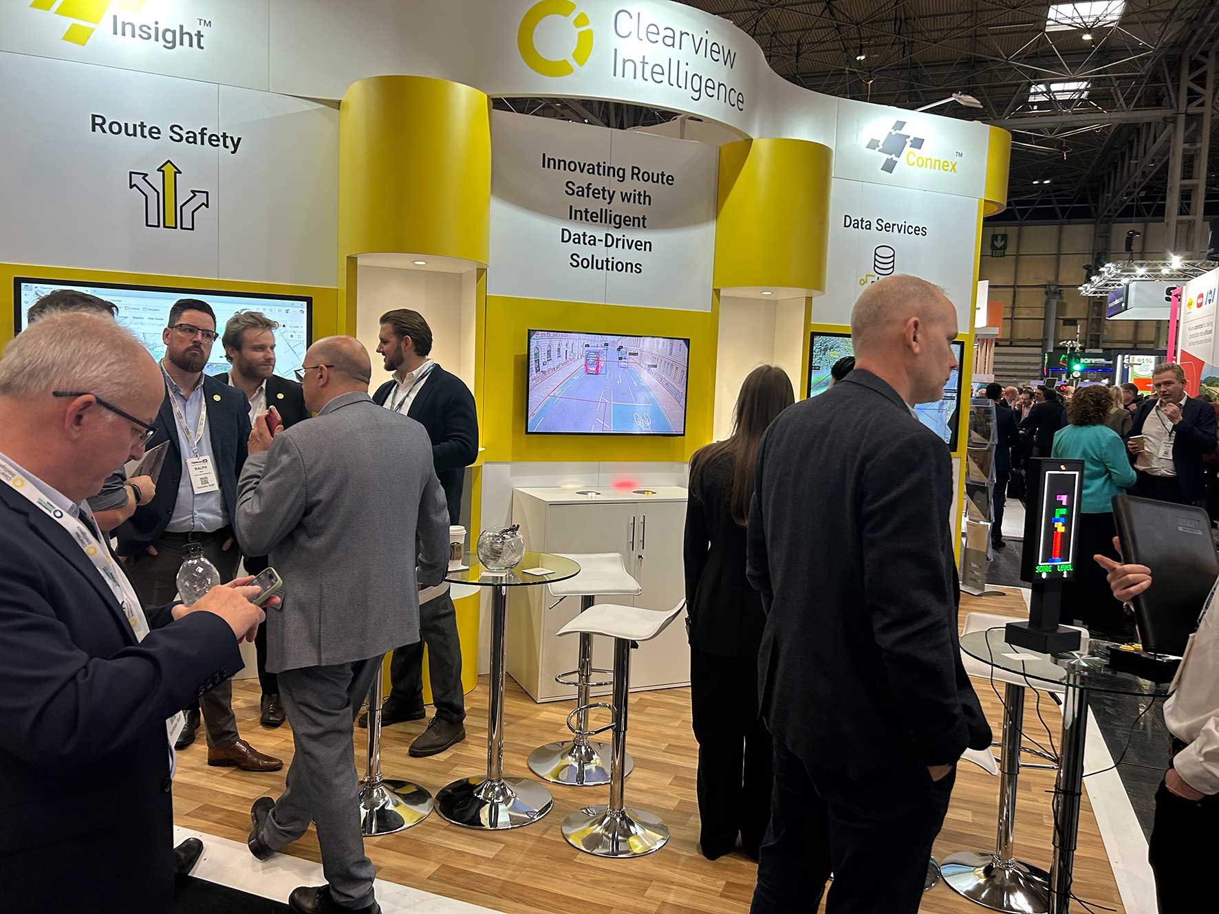 Clearview Intelligence team engaging with visitors at the company’s stand during an industry event